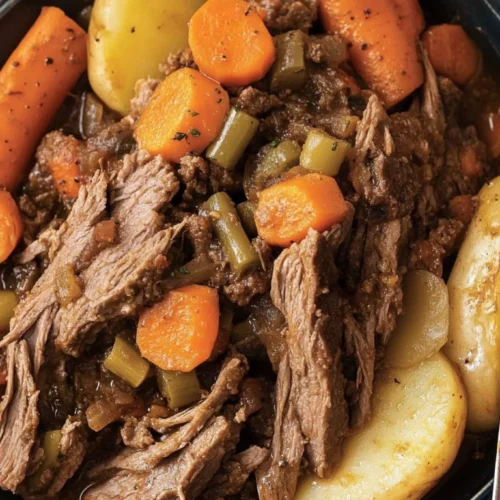 Classic Boneless Beef Chuck Roast Recipe 4 Tender boneless beef chuck roast with carrots, celery, and potatoes in a rich broth