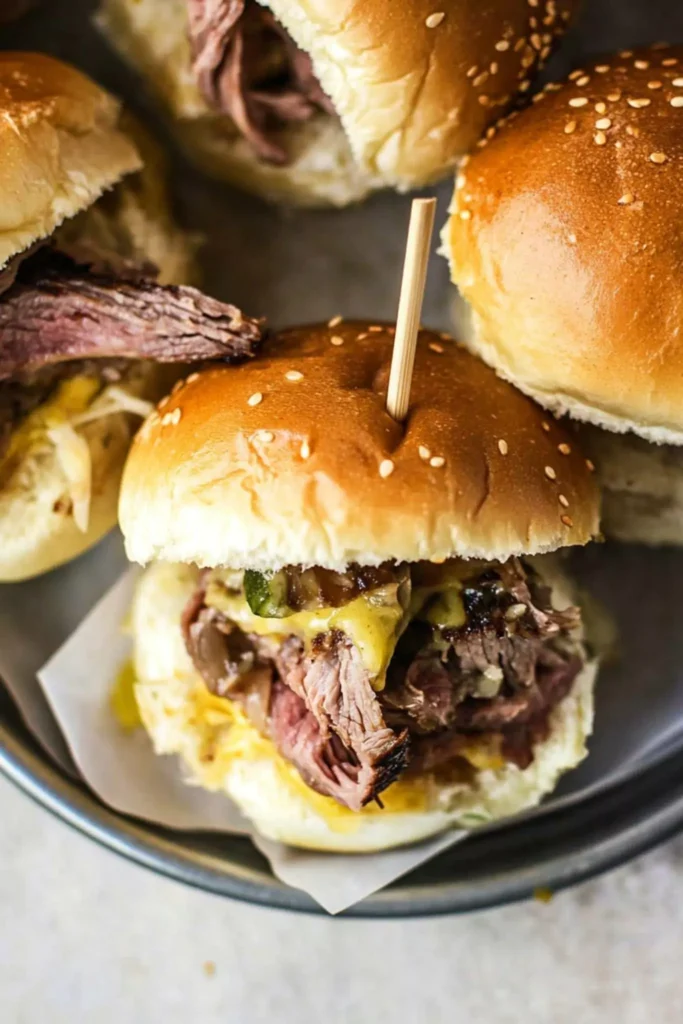Italian Roast Beef Sliders 2 Italian roast beef sliders on sesame buns