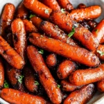 Roasted brown sugar carrots in bowl
