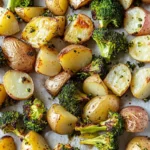 Roasted potatoes and broccoli on sheet pan